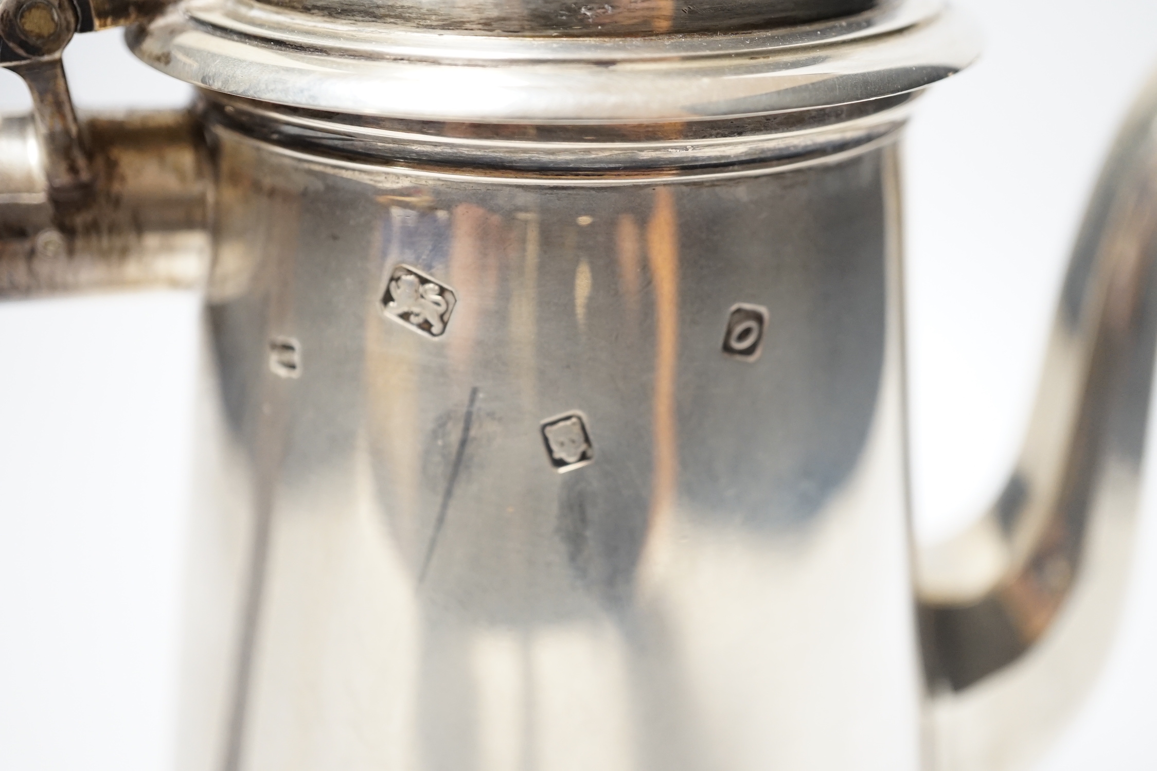 An Elizabeth II Queen Ann style silver coffee pot, John Henry Odell, London, 1969, gross weight 27oz.